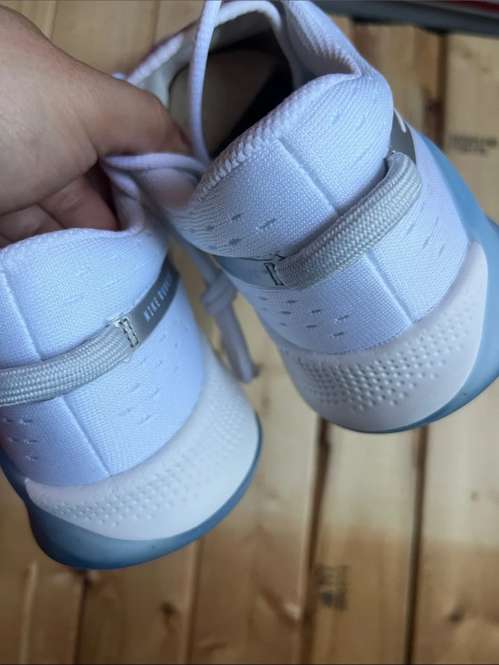 Nike Women’s White with Light Blue Accent Running Shoes